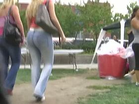 Sweet ass blonde girls get followed by a voyeur cameraman on a festival