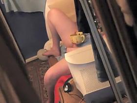 Peeping a horny girl from a window