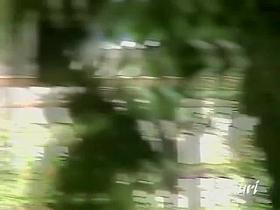 Cheerful Japanese doll is taking on the phone during sharking video