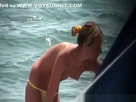 Tiny tits topless women at beach