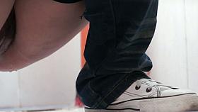 Cute Asian babe peeing in front of a hidden toilet cam