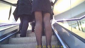 escalator upskirt skinny legs