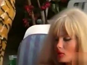 Bimbo slut with giant fake boobs fucked outdoors