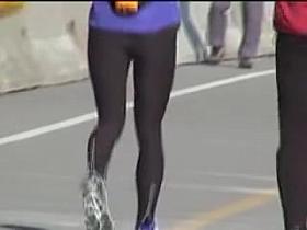 Candid babe is just running along the desolate road 08l