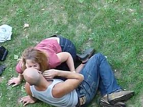 Man being wanked in public park