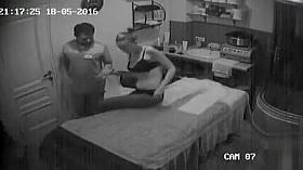 Brunette doll removes her top and receives a relaxing massage