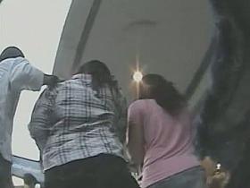 Her awesome jeans skirt is beingh filmed very closely