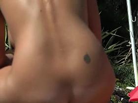 Adorable tanned butt on a beach