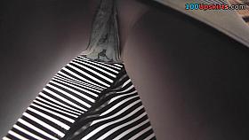 Sheer panty of a sexy lady seen in free upskirt video