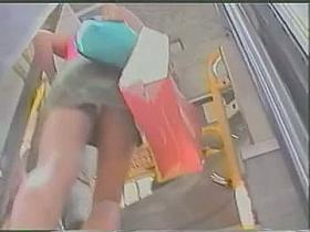 Upskirt public footage with unsuspecting woman in jean skirt