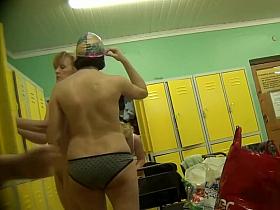 Pregnant woman changing her clothes