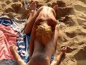 Sweet couple doesn't know about the voyeur