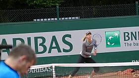 Leggy tennis babe practices in tight spandex pants