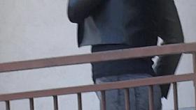 Hot blonde on a balcony