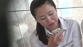 Sexy Asian Dangling Outside office in nylons Shoeplay