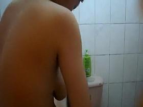 Fuckable asian girl peeped in the shower