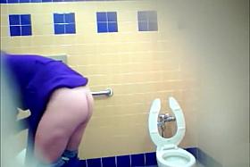 Pretty Mexican babe comes to take a piss