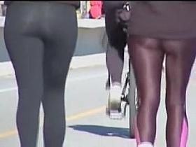 Candid babes in spandex pants are running in the street 01zc