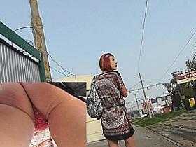 Classy redhead upskirt video