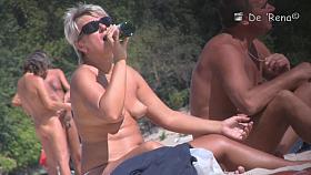 Teen girls in panties get their tits on beach voyeur video