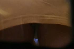 Sexy mature woman gets a camera shoved up her skirt