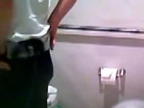 Fresh Asian girls peeing in the school toilet