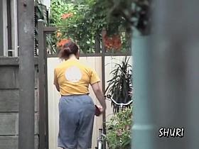 Street sharking with woman in jeans shorts 