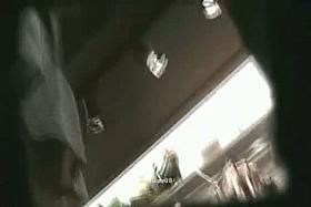 Slender Asian cutie invites an upskirt view of her butt