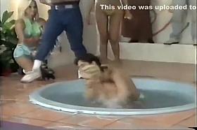 Playful wrestling drops her tits out