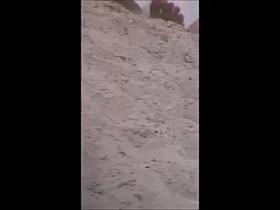 jiggly booty at beach voyeur,, slow motion