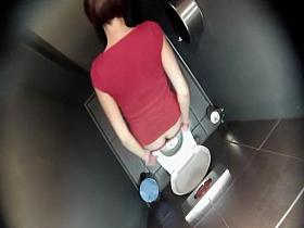 Filming her from a toilet ceiling