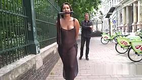 Brunette in see through dress in public
