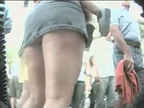 Upskirt video of a sexy chubby girl in a pink shirt