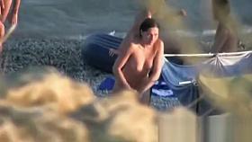 Naked and showing everything at the nude beach