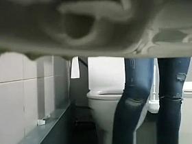 Concealed camera in public toilet catches ebony girl