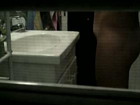 Teen with delicious hips and hairy pussy filmed through the window