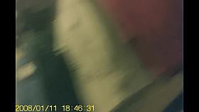 Girl in fitting room posing in new top before mirror