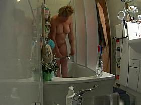 Hidden bathroom camera catches chubby wife showering