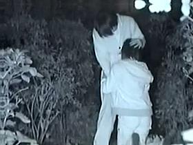 Voyeur films an Asian couple having sex in a park