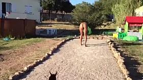 Hot redhead's public flashing her boobies