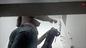 Spy cam girl in jeans charming titties out of brassiere