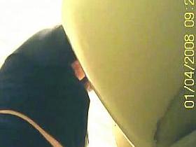 A big short haired redhead takes a fast piss shakes and books porn