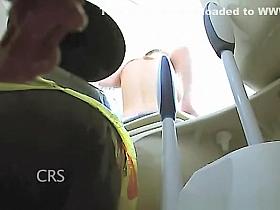 Busty woman changing dresses