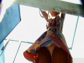 Woman in dressing room on the beach