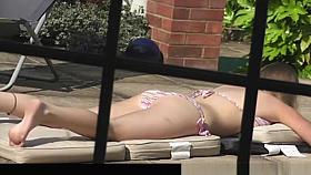 Sexy teen Enjoys Sunbathing