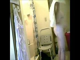 My 74years old granny caught nude after shower. Hidden cam