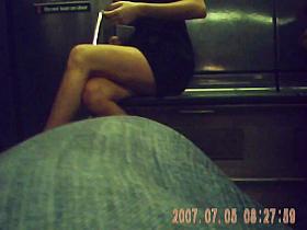 sexy college girl crossing legs on train