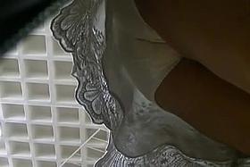 upskirt a mature coworker at work expo