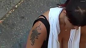 Woman with big breasts, large neckline.