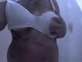 Chubby granny spied in the beach cabin